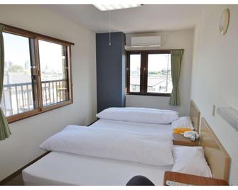 Business Hotel Izumi - Toyoake - Bedroom