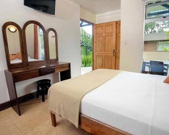 Hotel Eco Arenal - לה פורטונה - חדר שינה