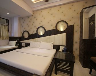 Hotel Navi Mumbai - Navi Mumbai - Schlafzimmer