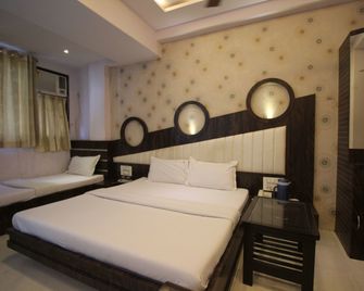 Hotel Navi Mumbai - נבי מומבאי - חדר שינה