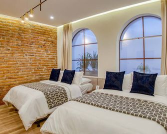 Wanderlot - Hotel Plaza Central - Riobamba - Schlafzimmer