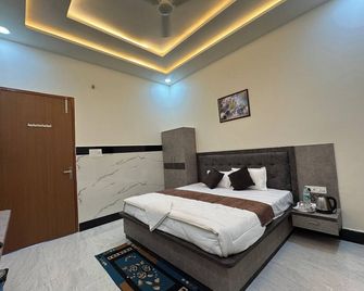 Satya Nikunj Inn - Vrindavan - Slaapkamer