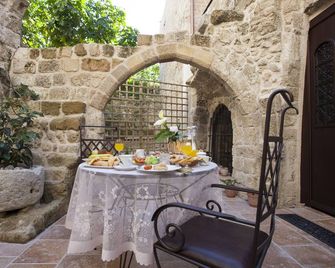 Porolithos Boutique Hotel - Rodos - Binnenhof