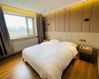 Longyi Hotel (Harbin Chinese Baroque Style Street Store) - Harbin - Bedroom