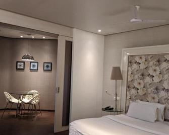 Hotel Sankam Residency - Belgaum - Bedroom