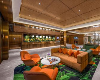 Orange Hotel Emeishan Hot Spring - Leshan - Area lounge