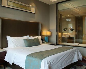 Zhangzhou Zhangpu Kingston Hotel - Zhangzhou - Schlafzimmer
