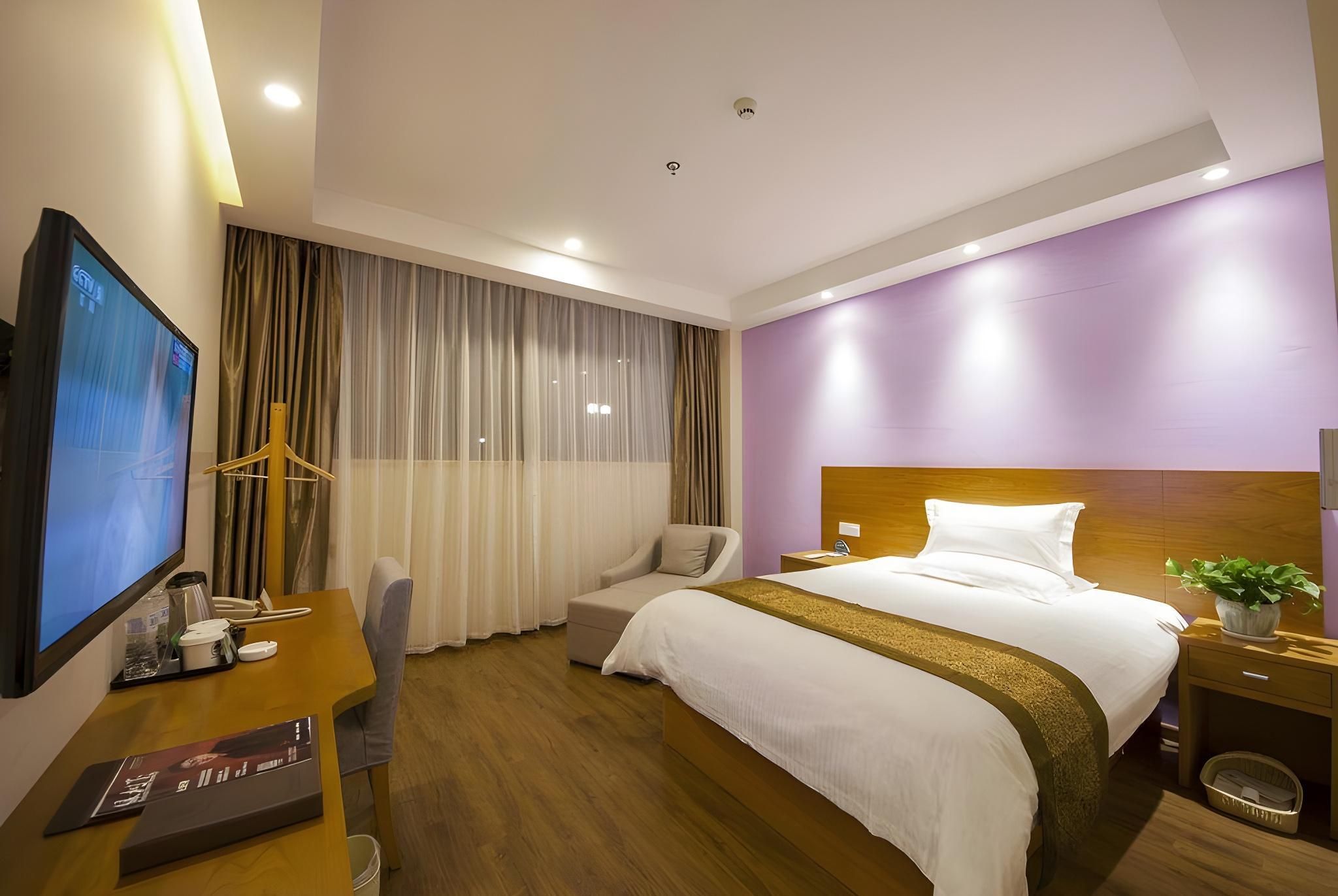 Greentree Inn Taizhou Jingjiang Zhongzhou Road Sunshine International Business Hotel - Taizhou - Schlafzimmer