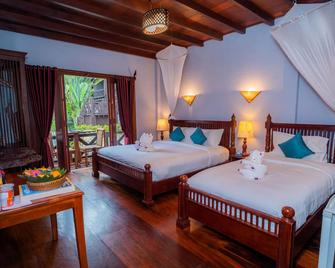 Muangthong Boutique Hotel - לואנג פראבאנג - חדר שינה