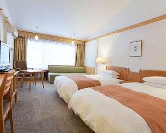 Sahoro Resort Hotel - Shintoku - Спальня