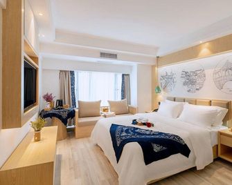 Doge Qiandu Four Seasons B&B (Guiyang Century City) - Guiyang - Habitación