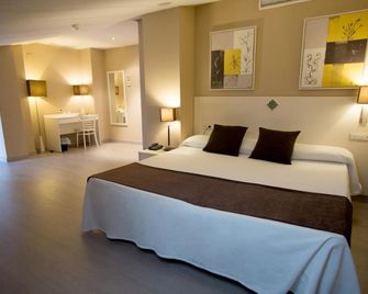 Hotel Torico Plaza - טרואל - חדר שינה