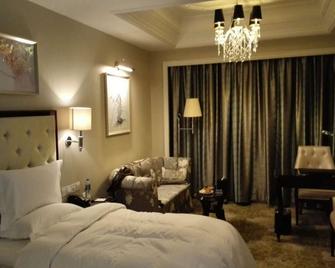 Yuncheng Jianguo Hotel - Yuncheng - Bedroom