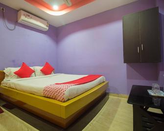OYO 10462 Smriti Guest House - Bagdogra - Yatak Odası