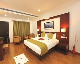 Raj Regency Hotel - Kollam - Camera da letto
