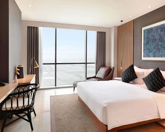 Novotel Samator Surabaya Timur - Surabaya - Schlafzimmer