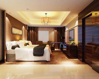Wanjia Oriental Hotel - Zhangzhou - Schlafzimmer