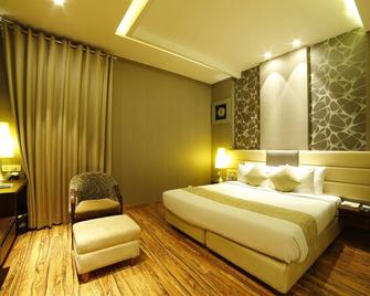 The Vivaan Hotel & Resorts Karnal - Karnal - Slaapkamer