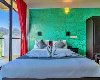 The View Munnar - Munnar - Schlafzimmer