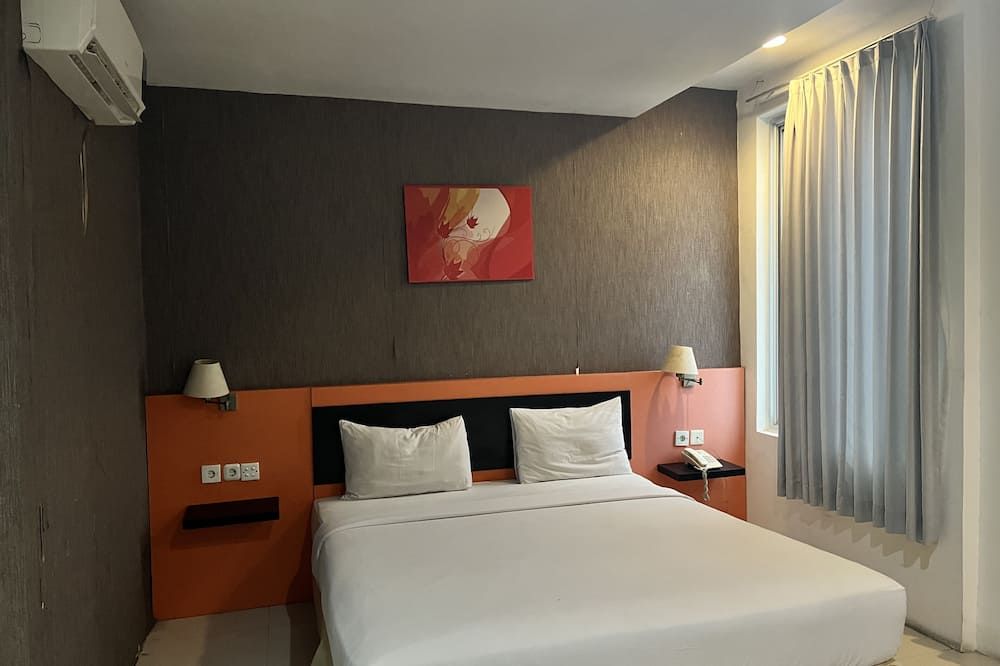 Hotel O Tri Homestay - Палангкарая - Спальня