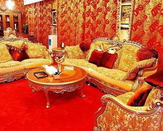 Yijia Mingshi Holiday Hotel - Xilin Gol - Living room