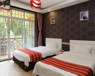 Ctn Li River Hotel - Guilin - Schlafzimmer