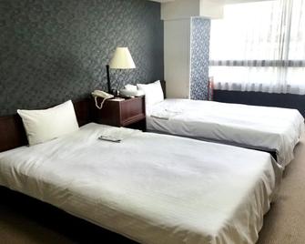 هوتل تاون سنتر - كوشي - غرفة نوم