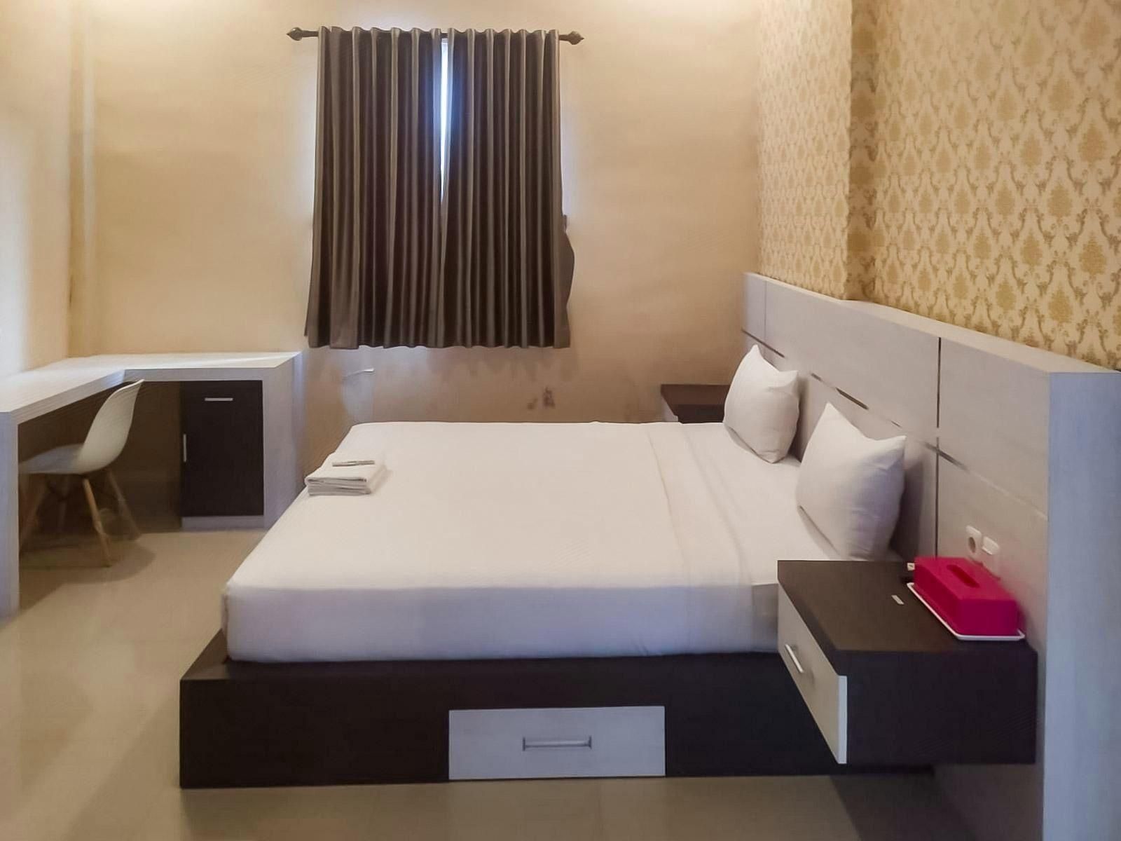 OYO 1539 Amryrooms - פקאנבארו - חדר שינה