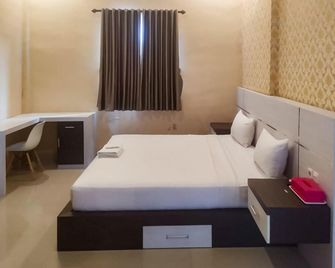 OYO 1539 Amryrooms - Pekanbaru - Bedroom