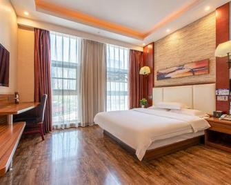 Luyuanchun Boutique Hotel (Jiaozuo University of Technology Shuangyong Theme Park) - Jiaozuo - Bedroom