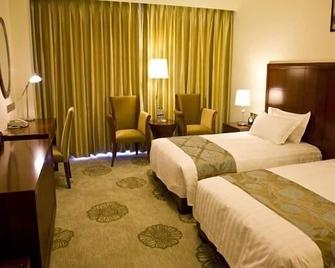 Jinjiang Hotel Qianan - Tangshan - Camera da letto