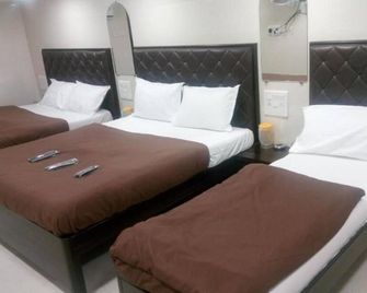 Hotel Qamar - מומבאי - חדר שינה