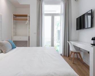 Pley Boutique Del Centro - Cagliari - Kamar Tidur