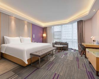 Lavande Hotel (Zibo Beijing Road Huaqiao Building Branch) - Zibo - Bedroom