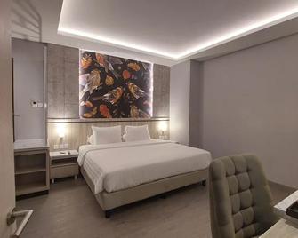 Sip Azana Hotel Jayapura - Jayapura - Bedroom