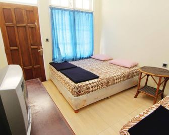 Hotel Wijaya 3 Kaliurang - Pakem - Schlafzimmer