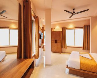 Hotel Beverly Palace Kozhikode - Hotel and Restaurant - Kozhikode - Schlafzimmer