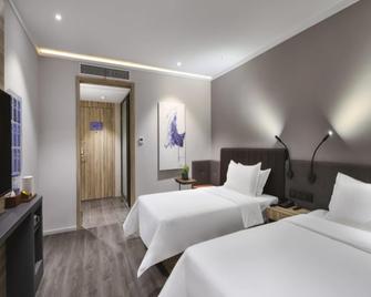 Hanting Premium Hotel Xuzhou Yunlong Wanda Plaza - Xuzhou - Habitación