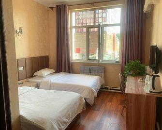 Yicheng Inn - Baotou - Habitación