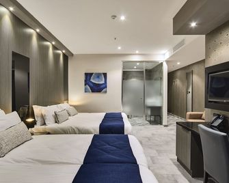 The District Hotel - St. Julian's - Phòng ngủ