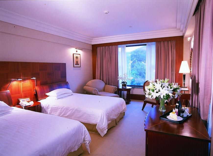 Nanshan Garden Hotel - דאליין - חדר שינה