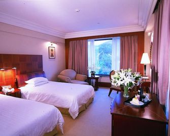 Nanshan Garden Hotel - דאליין - חדר שינה