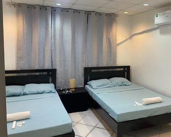 Entire 2nd Floor Apartment in Front of Robinsons Xentro Mall - Vigan City - Sypialnia