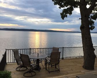 Incredible sunrises await you as you drink coffee and overlook the main lake. - Gilbertsville - Balcony