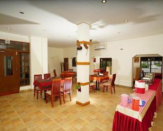 Sadhoo Inn - Kannur - Restaurante