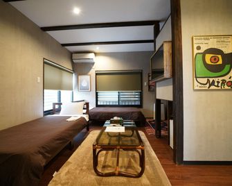 Traditional Apartment Takamatsu Guesthouse - טקאמאטסו - חדר שינה