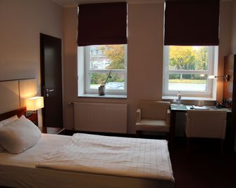 Adena Hotel - ברמרהאבן - חדר שינה