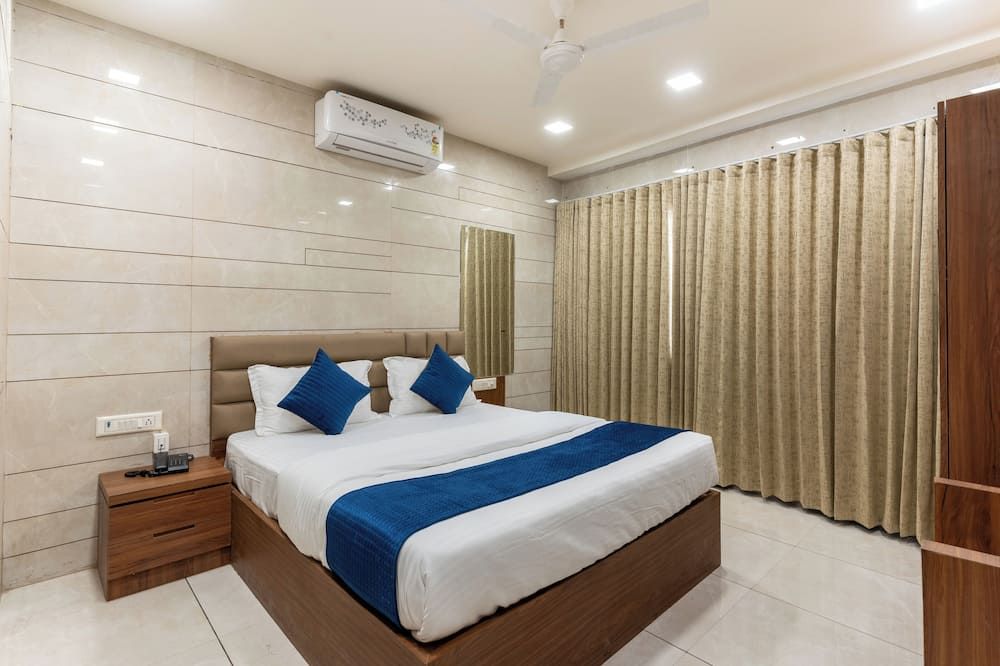 Hotel Noble Inn - אחמדאבאד - חדר שינה