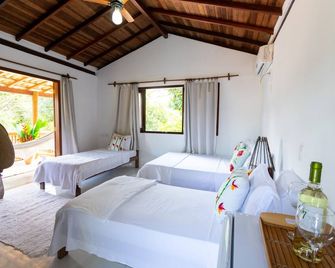 Pousada Jequitibá - טרנקוסו - חדר שינה