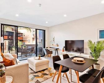 Jewel on Jubilee - New 1 Bed Apt with Parking - Port Adelaide - Living room